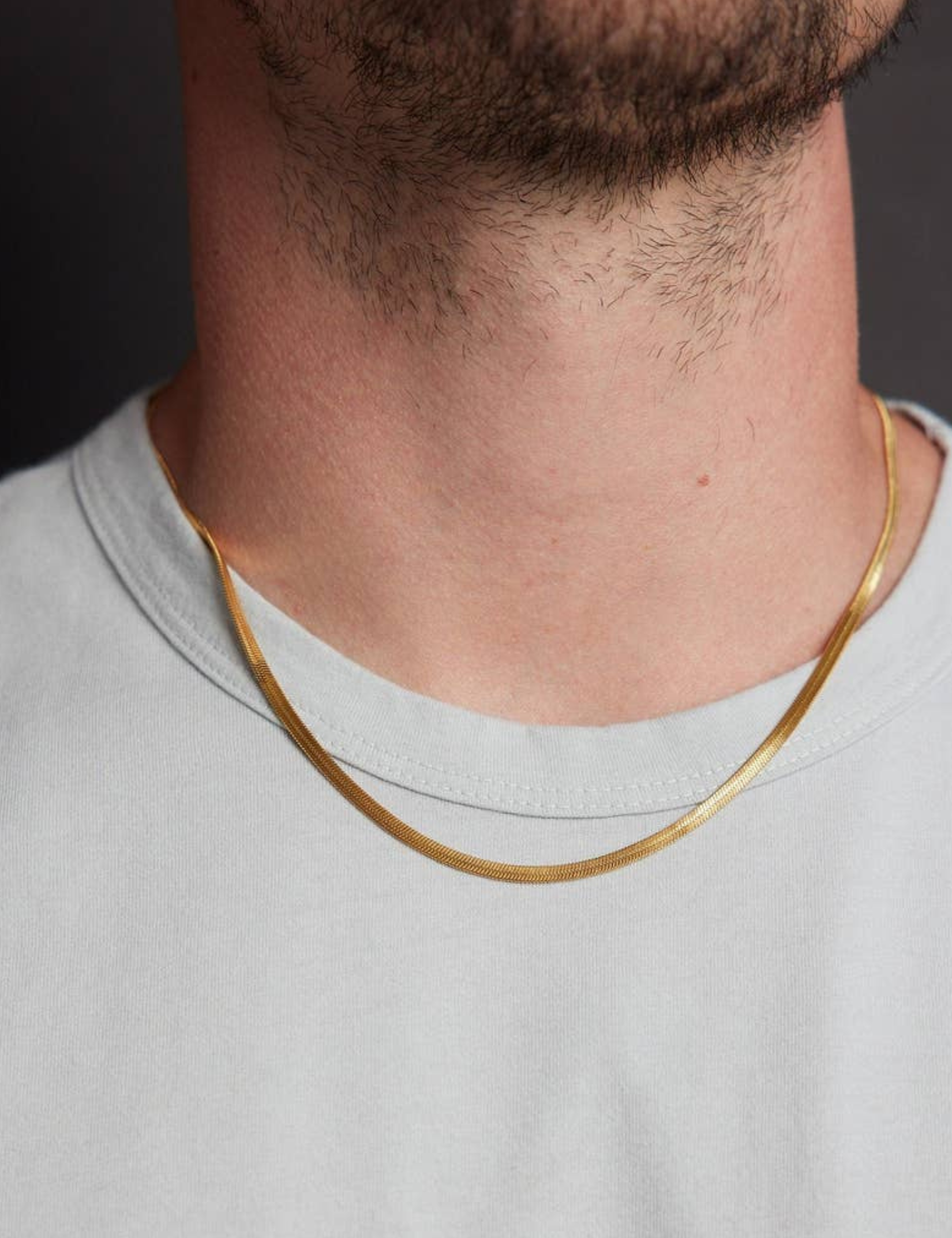 Faire-Product_Pics_-_We_Are_All_Smith_3mm_Herringbone_Gold_Chain_Necklace_3.png