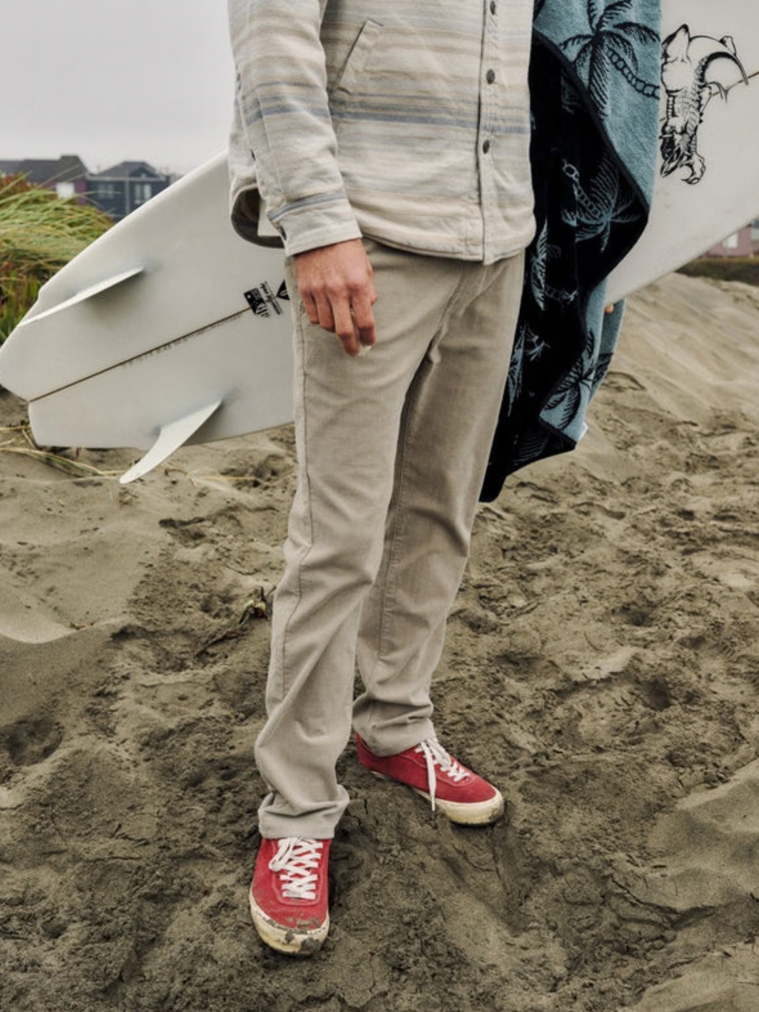 Katin Pipeline Corduroy Pant Khaki Slim Straight Leg Fit lifestyle model on beach