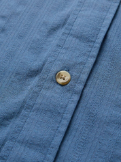 Seager Caldera Short Sleeve Shirt Button Up Collared Men’s Top for Men Faded Denim Blue Textured Tops for Guys Spring Summer Athens GA Georgia Kempt Menswear Store Near Me